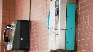 Ominous-looking device with an array of buttons and symbols in a dimly lit environment, conveying a sense of power and potential for unknown functions.